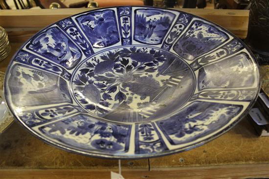 Japanese Arita large blue and white deep dish, 17C (extensively damaged and restored)